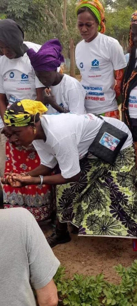 Woman bending in Senegal